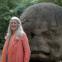 Mary Beard dwarfed by huge Olmec Head, c. 900-400 BCE, Villahermosa, Mexico