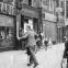 Dancing outside the Levy’s shop on Whitechapel High Street, 1940s