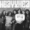 Spot the familiar faces - some Birmingham musicians gather outside Heavy Head Records in 1971