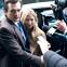 James and Sophie Whitehouse (Rupert Friend and Sienna Miller) run the media gauntlet