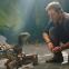 Chris Pratt as Owen Brady, ace dinosaur-wrangler, with baby Blue