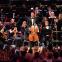 Mirga Gražinytė-Tyla and CBSO players congratulating Sheku Kanneh-Mason after his performance of Elgar's Cello Concerto