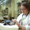 Conservator Jo Hackett restores Pumpy, the 120-year-old toy elephant