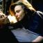 Gary Oldman as Jake Grimaldi and Lena Olin as Mona Demarkov