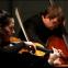 Violinist Siún Milne and double-bassist Nikita Naumov, a joy to watch as well as hear