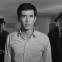 A man who swears he's not to blame: Anthony Perkins, centre, as Josef K