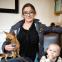 Jo-Rosie Haffenden with one of her dogs and her son Santino