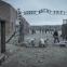 Prisoners convert the former Polish army barracks into the notorious death camp