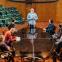 Pass the Perrier: Conleth Hill (centre) and the cast of 'The Antipodes'