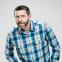 Dave Gorman's clicker, laptop and large onstage screen are as much part of his set as his gags