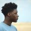 Sam Adewunmi as the broody 16-year-old Femi
