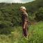 Figure in a landscape: Benedicta (Benedicta Sánchez) contemplates her country