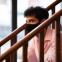 Raffaello Morales on the staircase of the Fidelio Orchestra Cafe listening to a recital