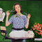 A snip in time: Joony Kim plays the hostess of a dog grooming show
