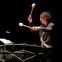 Conductor Robin Ticciati in unusual mode as bass drum MC in Harrison Birtwistle's 'Cortege'